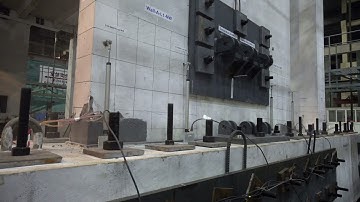 Low-damage concrete building earthquake test: Wall base with steel pocket and armouring + no dampers