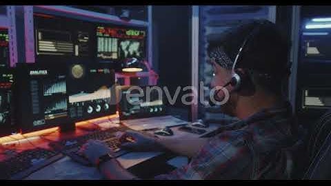 Hacker Using Computer with Multiple Monitors | Stock Footage - Envato elements