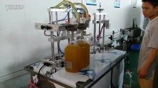 Semi automatic dual head edible oil filling press push capping machine