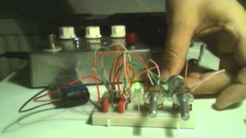 DIY synth "Atari Punk Console" with 556 timer on breadboard.