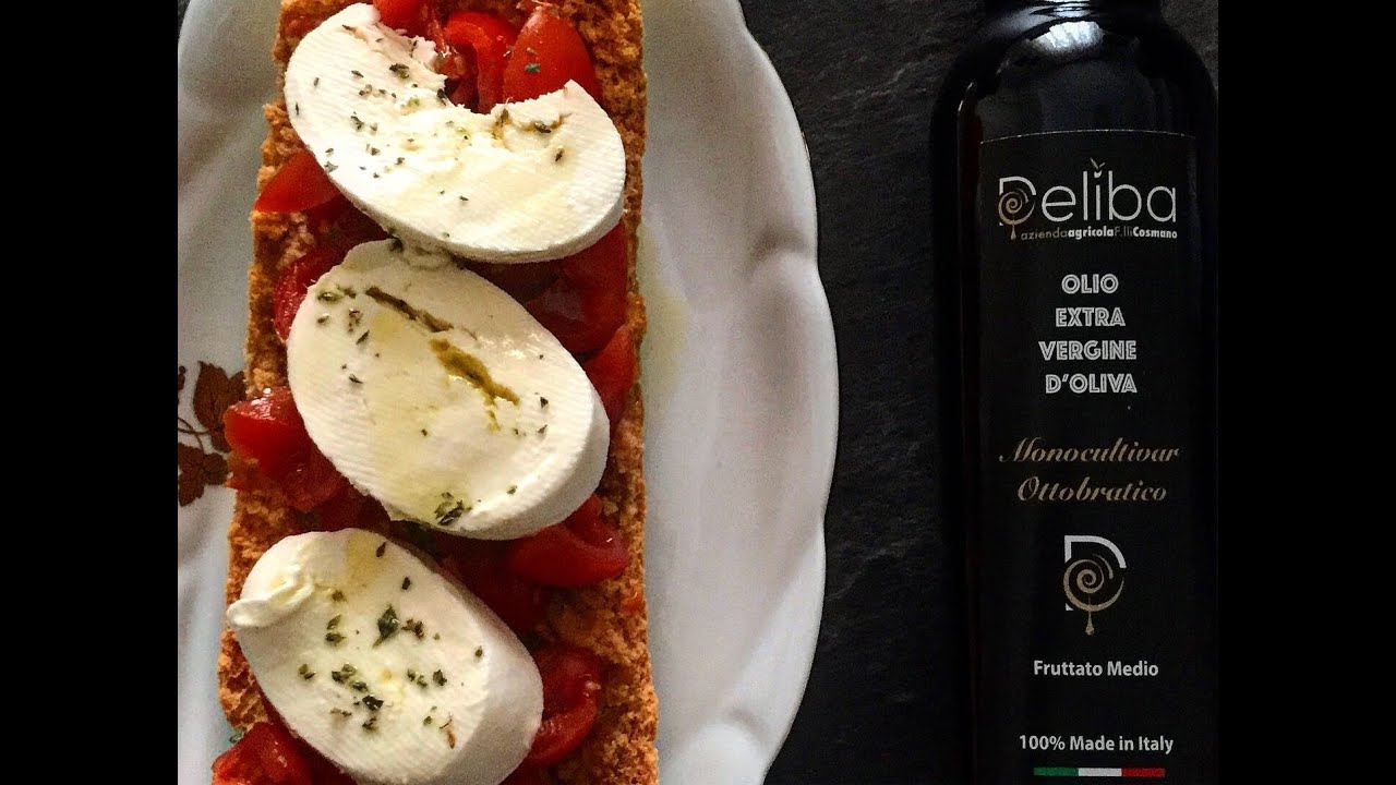 Deliba olive oil served on tomato bruschetta