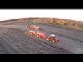 Two Versatile 550 Tractors pulling Nuhn Manure Tankers in Iowa