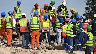 11 workers found alive beneath rubble after South Africa building collapse