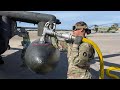 Fueling Massive External Tanks of US Assault Helicopter Before Mission Takeoff