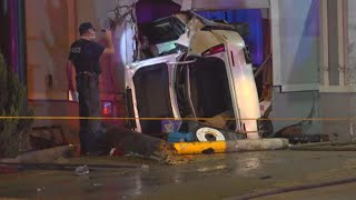 Two dead after car smashes into Super 8 hotel