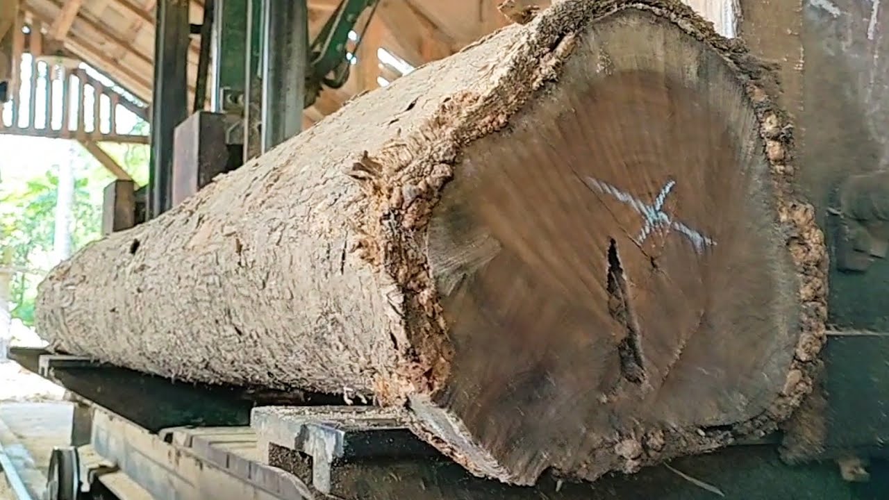 the process of sawing teak wood to make frame blocks - YouTube