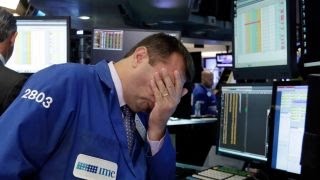 Which sector is flattening stocks to session lows?