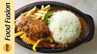 The ultimate home made goodness. restaurant quality chicken sizzler
with garlic rice. just make it once and everyone will ask where you
ordered from. #hap...