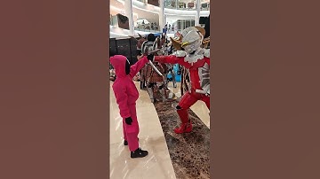 "Pink Guard vs Ultraman (IG : Gopitel_cos)". #squidgame #ultraman #cosplay #shortvideo