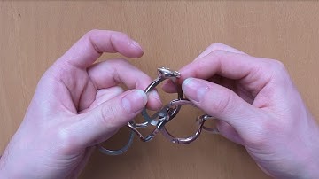 E13 - SOLUTION - Ring II by Hanayama Cast Puzzles