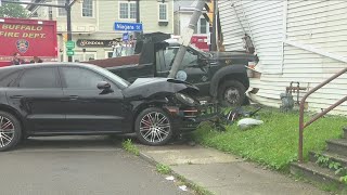 Buffalo DPW vehicle narrowly misses child, crashes into vehicles and a building on Niagara Street