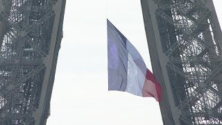 Large French flag hangs from Eiffel Tower to mark 75 years since end of World War II | AFP