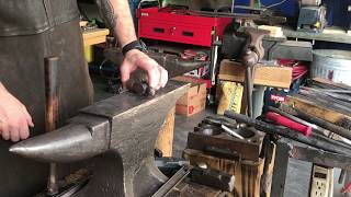Blacksmith Forging A New Slot Punch Out Of An Old Ball Peen Hammer