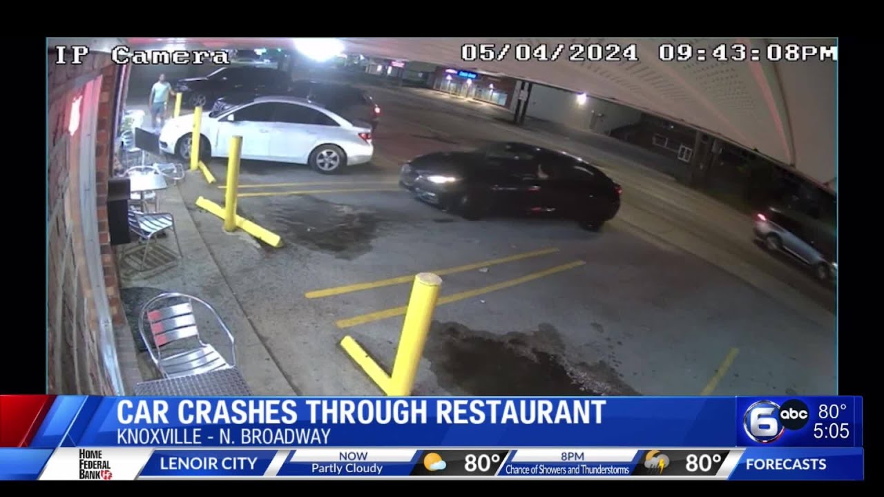 Woman charged after car crashes into restaurant on Broadway - YouTube
