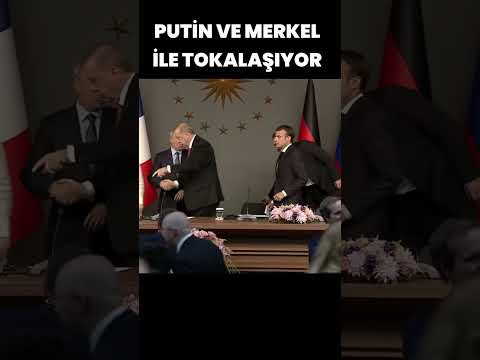 Erdoğan Macron'un Elini
