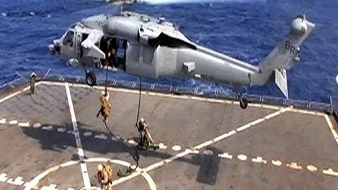 Marines fast rope onto the USNS Robert E. Peary from an MH-60S Seahawk | AiirSource