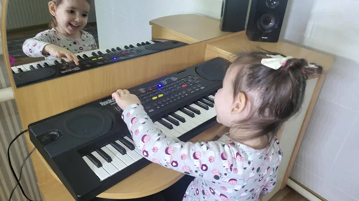 Daria playing to piano/ making music/