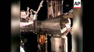 Space shuttle Discovery arrived at the International Space Station on Saturday, making its final vis
