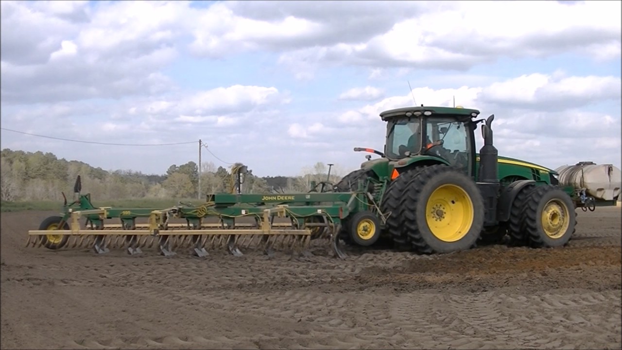 What are the component parts of a moldboard plow?