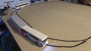 Simple RocRail schedule, Bus 1 starts and triggers Bus 2 when back at the original location