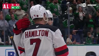 Dougie Hamilton scores a goal against the Dallas Stars