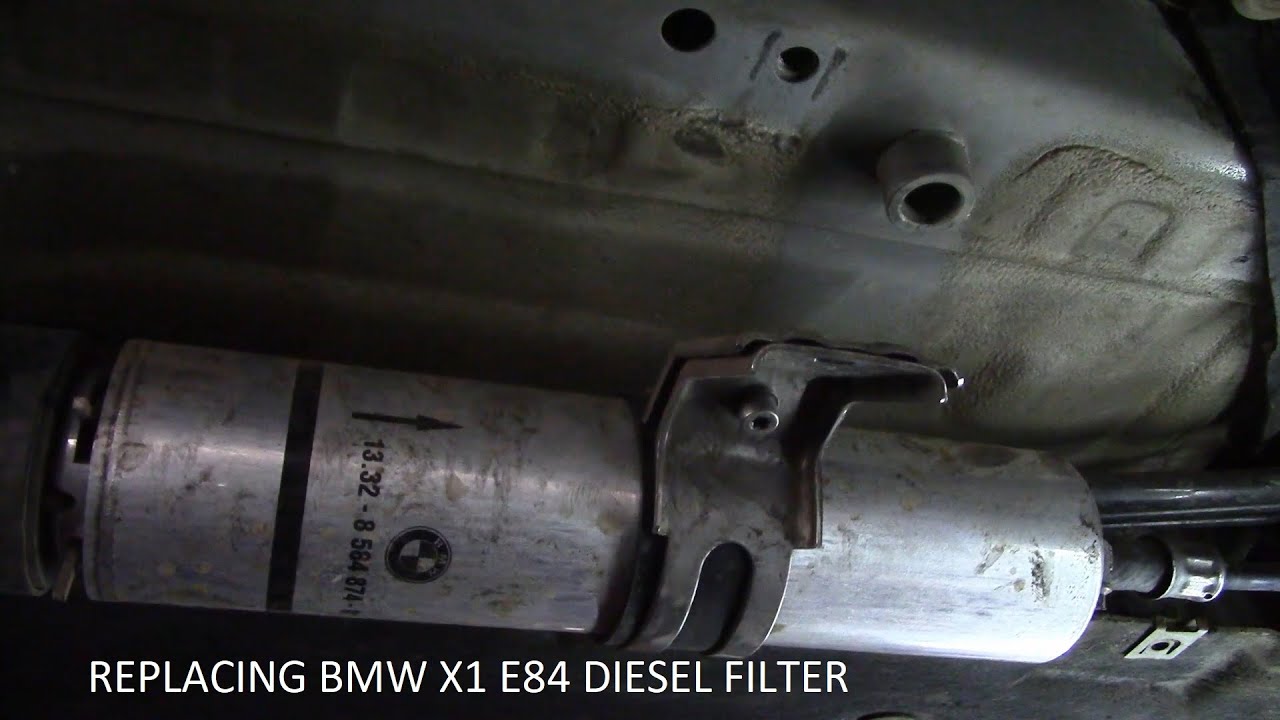 Replacing BMW X1 e84 2.0 diesel filter at home without lift or special tools, up close angles