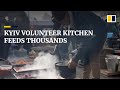 Volunteers at roadside kitchen feed thousands near Kyiv front line