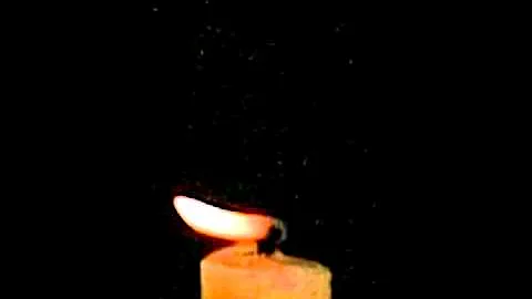 Water Mist on Candle Flame - Slow Motion