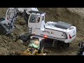 Liebherr 970 SME front shovel loading trucks