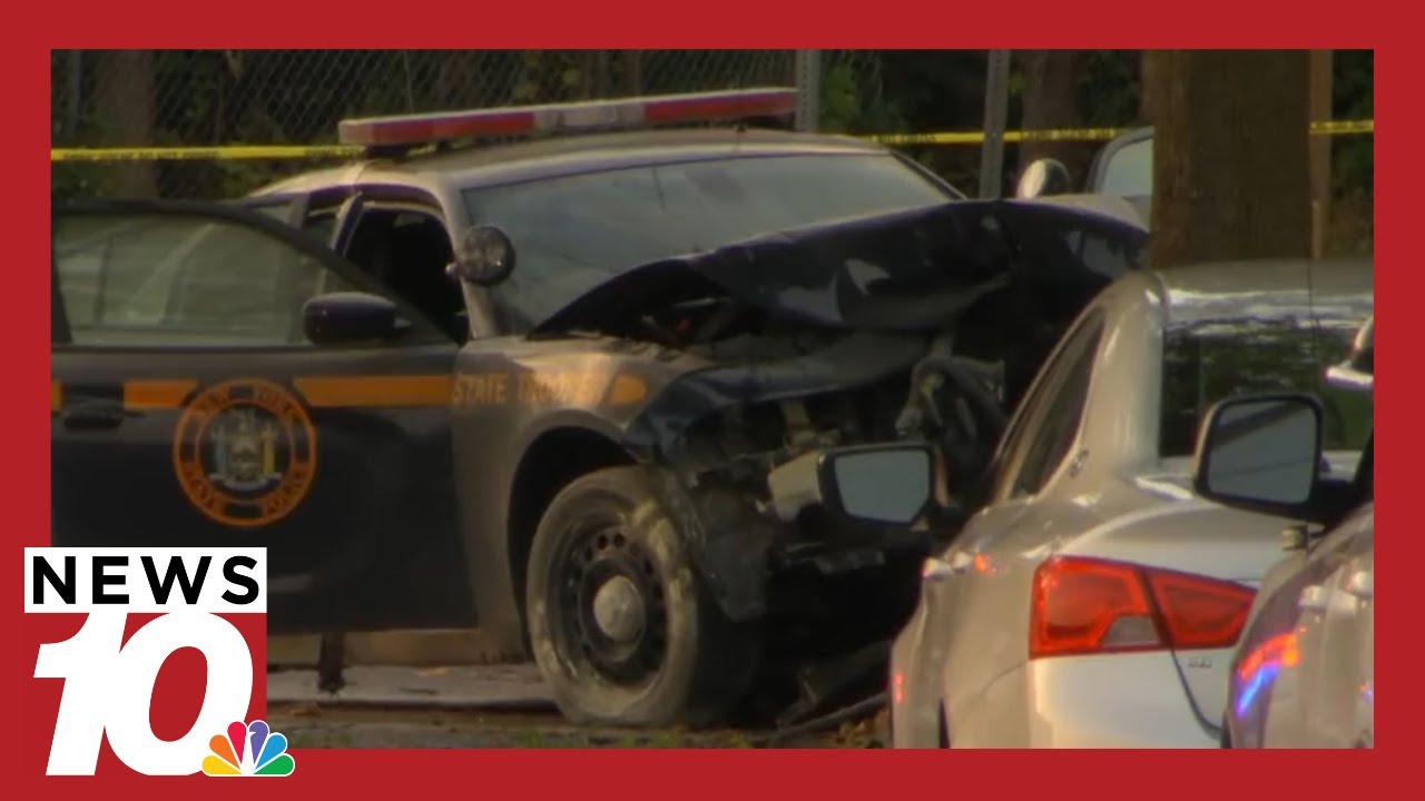 Two troopers hurt after crashing into tree in city while chasing stolen ...