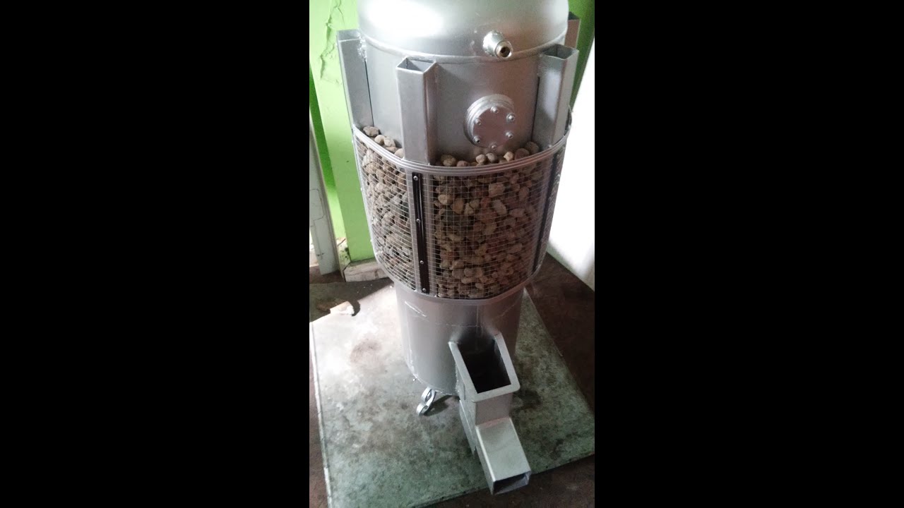 Piec rakietowy SZUWAREK koza holzgas rocket stove heater water - YouTube