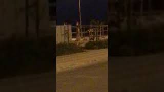Idiot dances on street sign for no reason