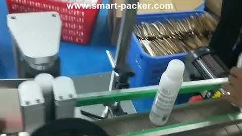 Cosmetic spray bottle automatic label positioning labeling machine testing video label applicator