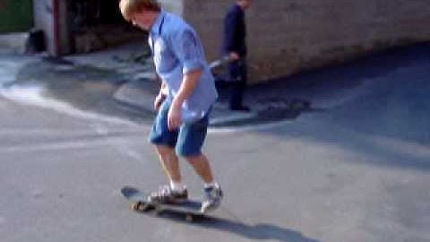 Frontside kickflip 180 off loading dock