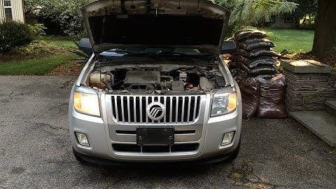 HOW TO: Ford Escape / Mercury Mariner / Mazda Tribute Headlight Bulb Replacement (2008-12)