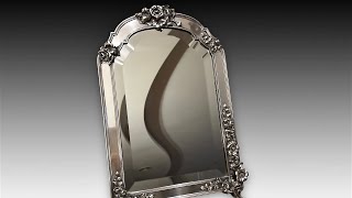 Антикварное зеркало в серебряной раме