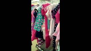 Shopping in the baby section at Savers thrift store