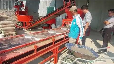 Máy cấp liệu khay nhựa tự động làm gạch lục giác ziczac Hồ Hoàn Cầu 0915238211