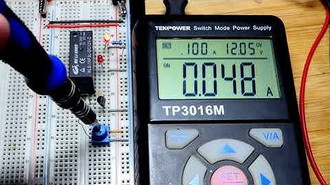 Non latching relay controlled by trimpot voltage divider with 2N2222 NPN BJT switch circuit