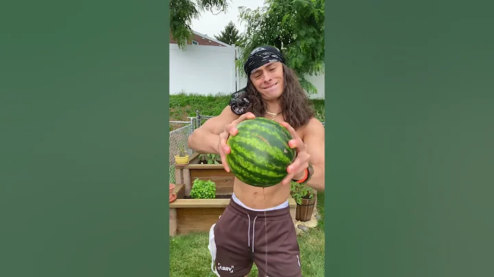 OPEN WATERMELON WITH HAND