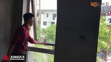 Hệ Thống Cửa Sổ Mở Hất Nhôm Xingfa Kết Hợp Vách Kính Phía Dưới