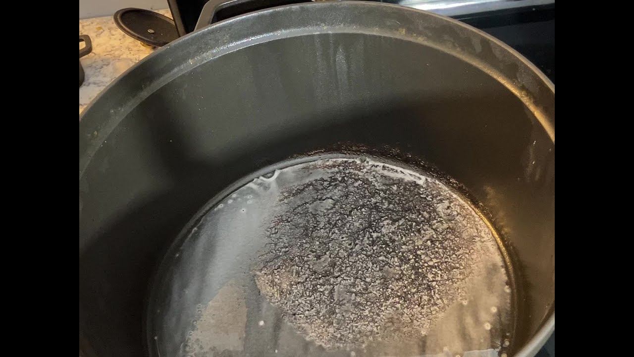 My partners Cuisinart cast iron pot, how do I get this black stuff off? :  r/CleaningTips