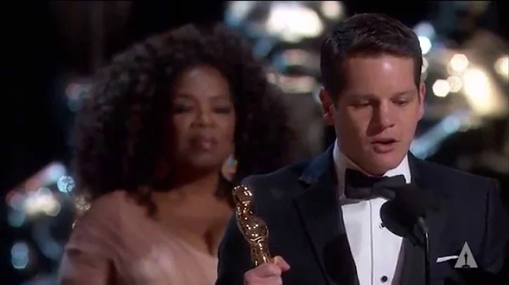 Graham Moore winning Best Adapted Screenplay for "...