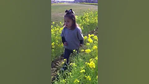 Estella in the flowers
