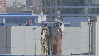 Building damaged after Russian says air defences shoot down drone over central Moscow