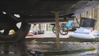 Queens water main break damages cars
