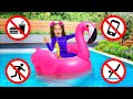 Sasha plays with inflatable toys in pool challenge