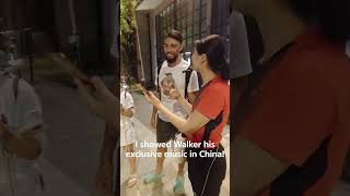 I showed Walker his exclusive music in China. #ufcshanghai #johnnywalker #ufcfans #ufcfanexperience