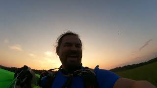 happiness right after the landing of a skydive from a hot air balloon