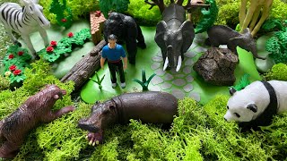 Mini diorama with Playmobil and wild animals